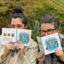 Load image into Gallery viewer, Try as they might, author Teresa Adamo and illustrator Jennifer Williams-Cordova couldn’t hide their excitement when their “Bakersfield A to Z” book arrived!
